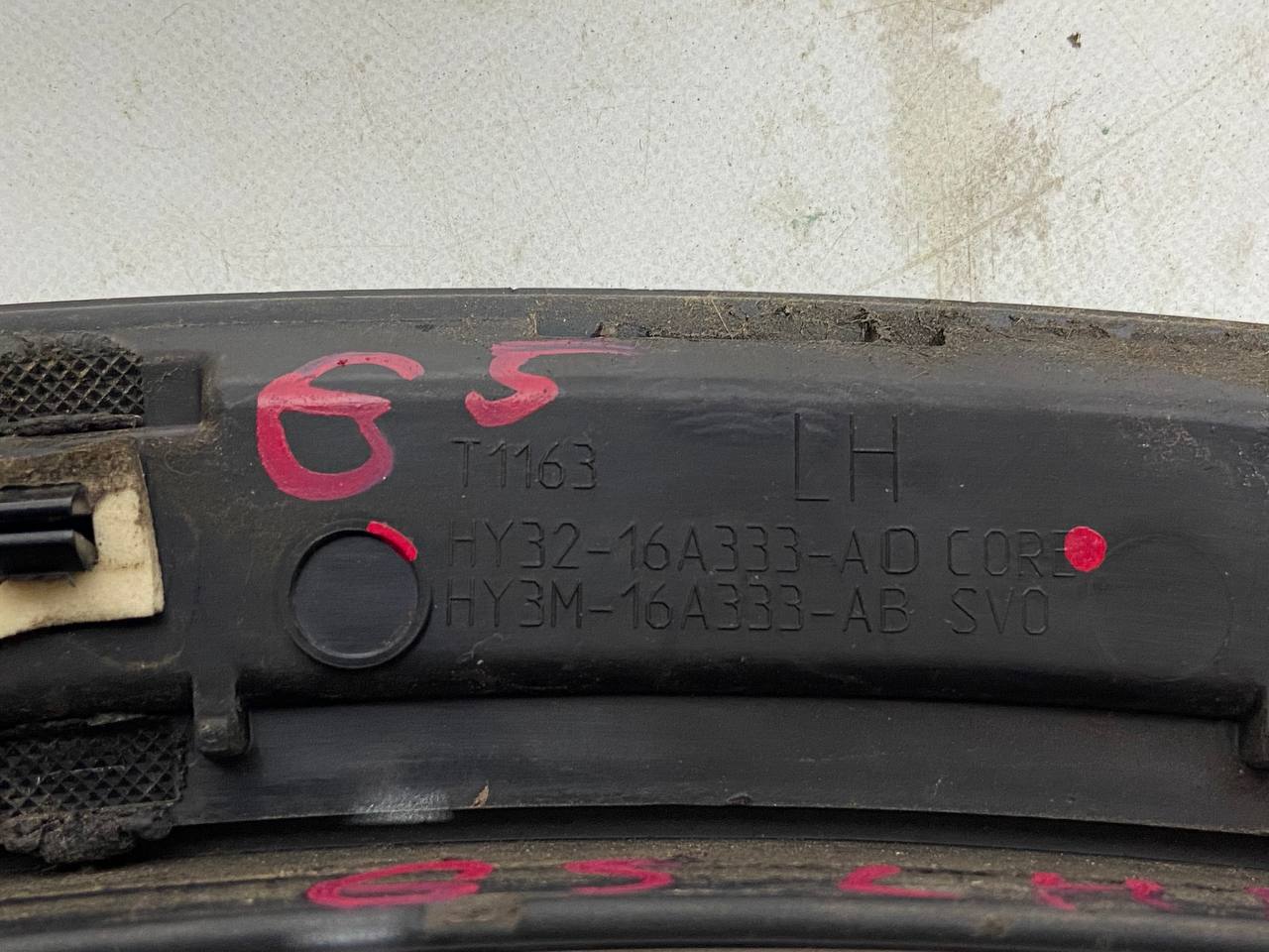 LR117004 Rear left door arch trim Land Rover Discovery 5 L462 used - Image 13