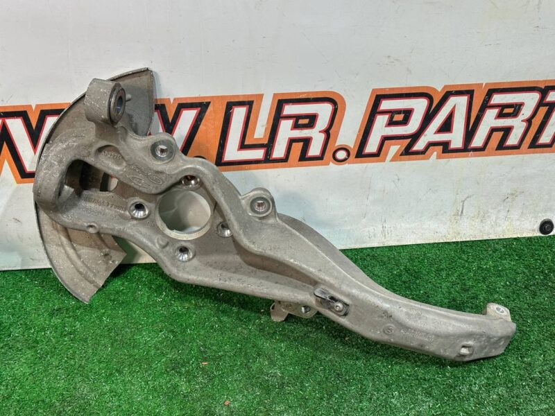 LR141975 Steering knuckle (trunnion) front left Range Rover Velar L560 (2018-) used cost 320 € in stock 1 pcs.