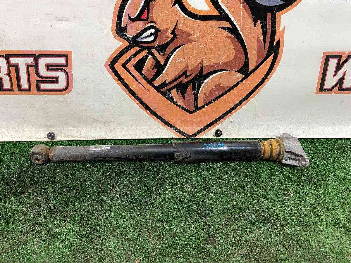 BJS728700F Shock absorber rear left MAZDA 3 used