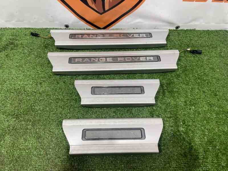 LR038303 Set of threshold overlays with illumination Range Rover L405 (2013-2021) Used cost 250 € in stock 1 pcs.